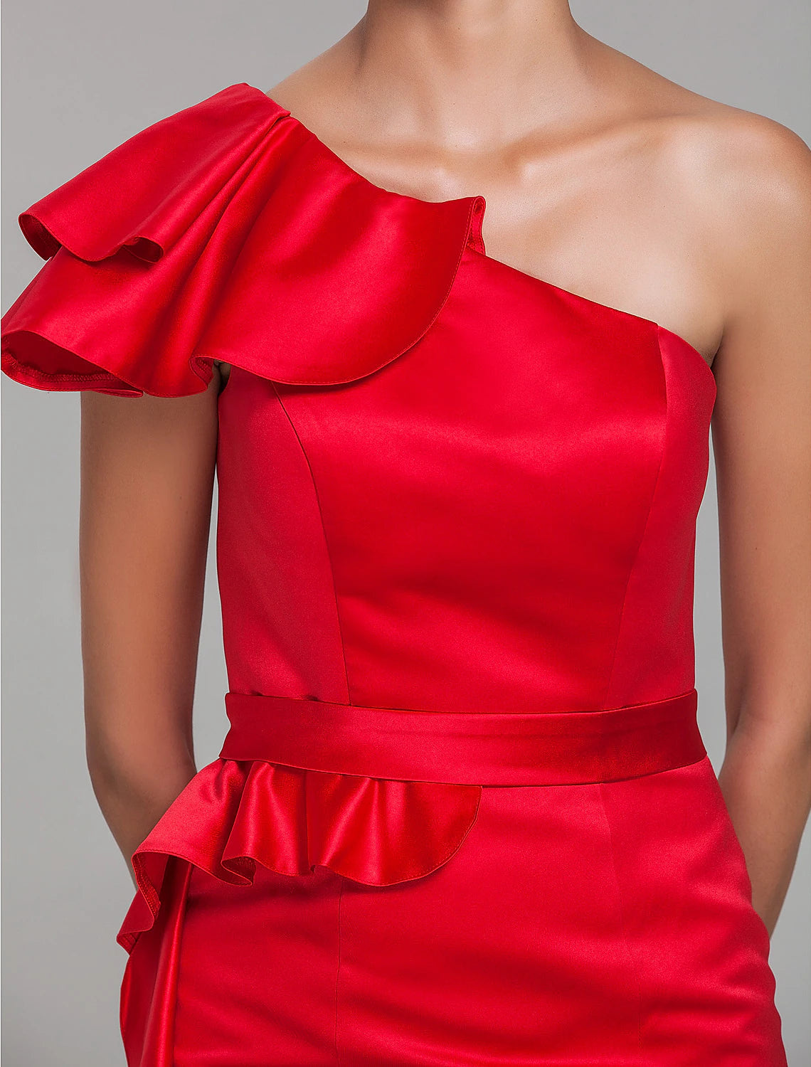 Weitese elegant mini dress with a one-shoulder neckline and flowing ruffles.