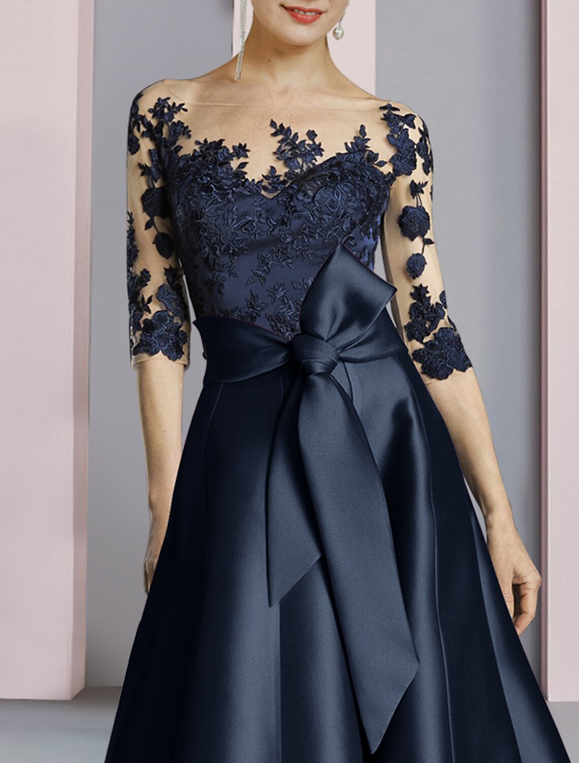 Side profile of the elegant Weitese mother of the bride gown, showcasing half sleeves.