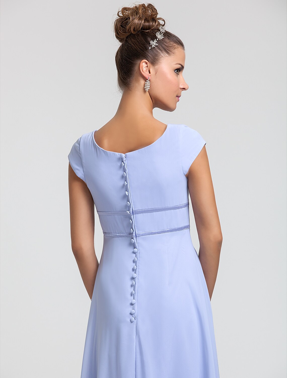 Full-length view of the chiffon dress, showcasing its elegant column silhouette.