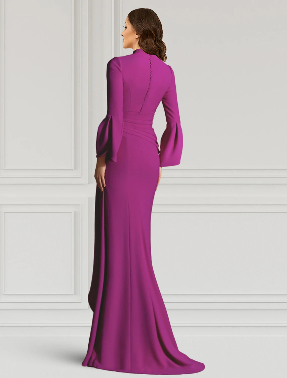 Model showcasing the elegant black floor-length formal dress.