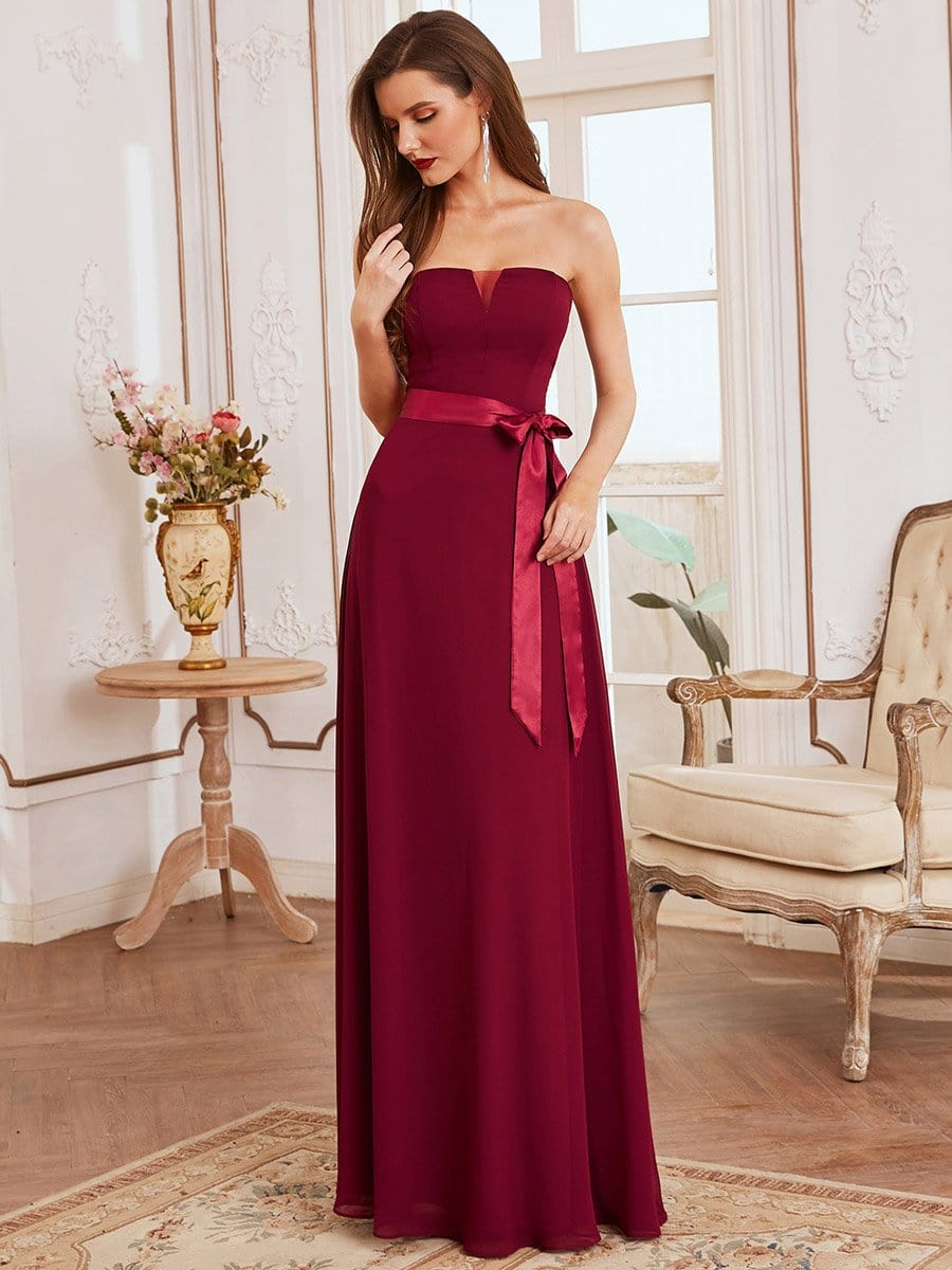Weitese elegant strapless A-line bridesmaid dress with knotted waist, front view.