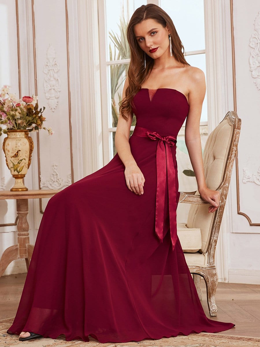 Back view of Weitese long A-line bridesmaid dress with flowing skirt.
