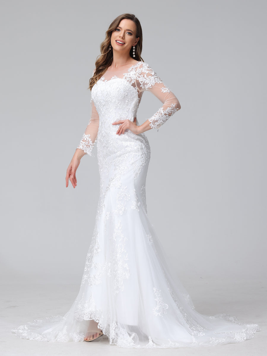 Back view of a bride in a white lace trumpet mermaid wedding dress, highlighting the lace details and train.