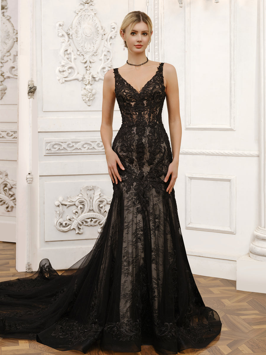 Elegant V-neck tulle mermaid wedding dress with lace appliques.