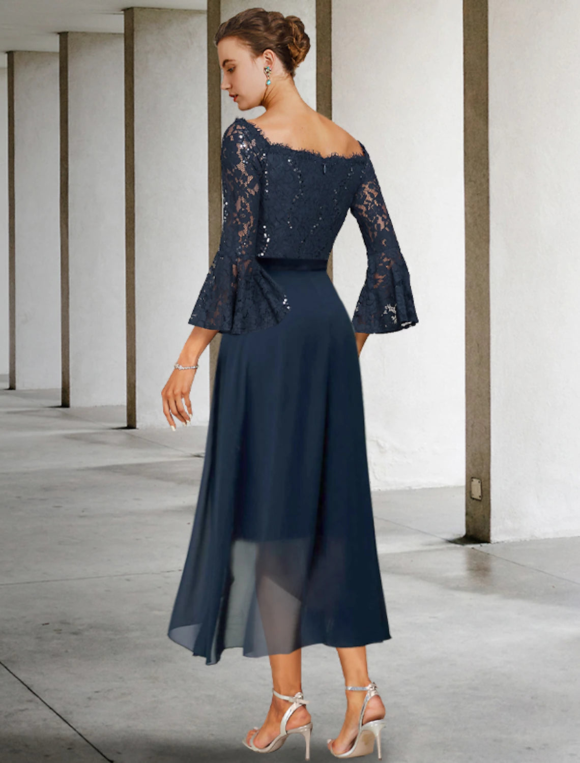 Close-up of the off-shoulder lace top with 3/4 sleeves from the two-piece dress.