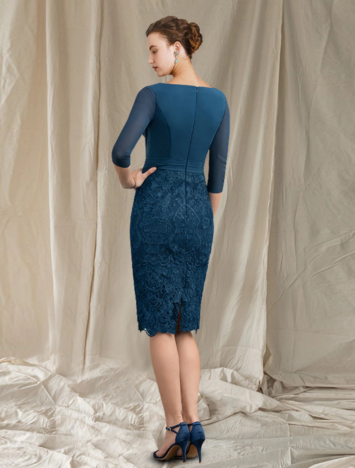 Full view of the two-piece formal dress, highlighting its elegant design.