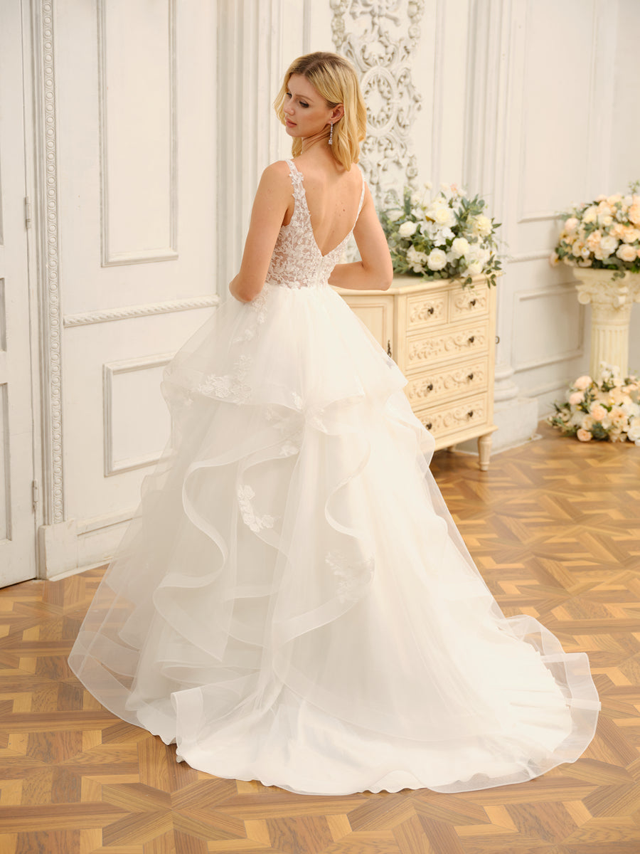 Side view of the elegant V-neck ball gown wedding dress, showcasing appliques.