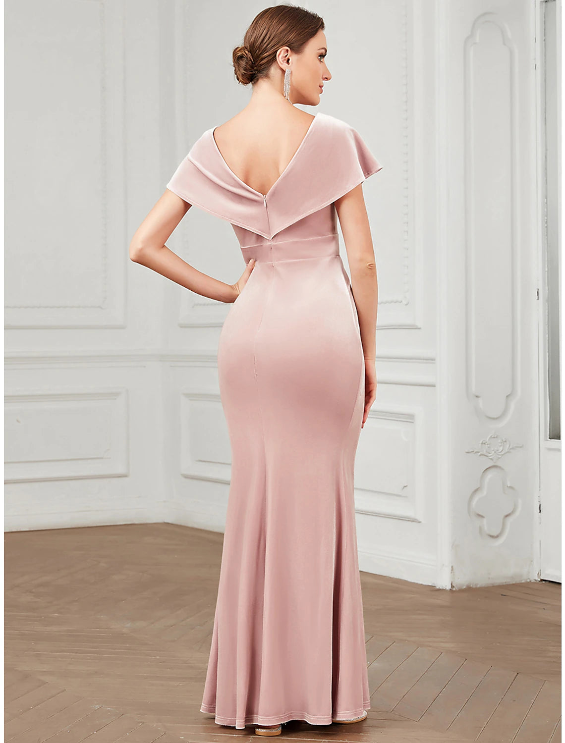 Back view of the Weitese velvet mermaid gown, showcasing the V-back and elegant ruffles.