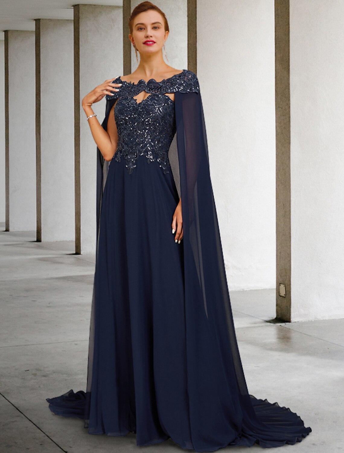 Elegant two-piece A-line strapless mother of the bride gown with lace and sequin appliques.