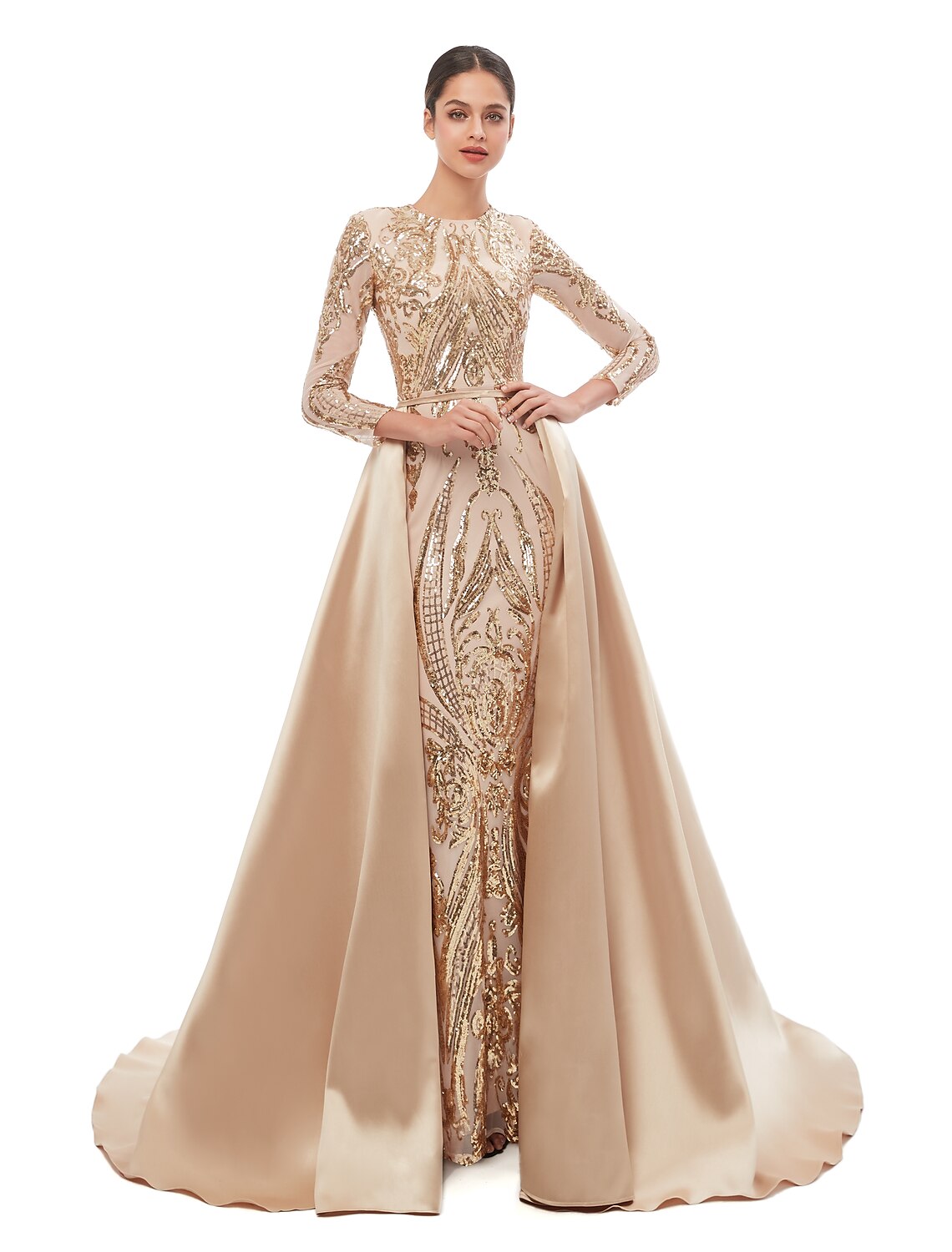 Woman wearing an elegant vintage mermaid prom dress with long sleeves and jewel neck, featuring detachable sequins.
