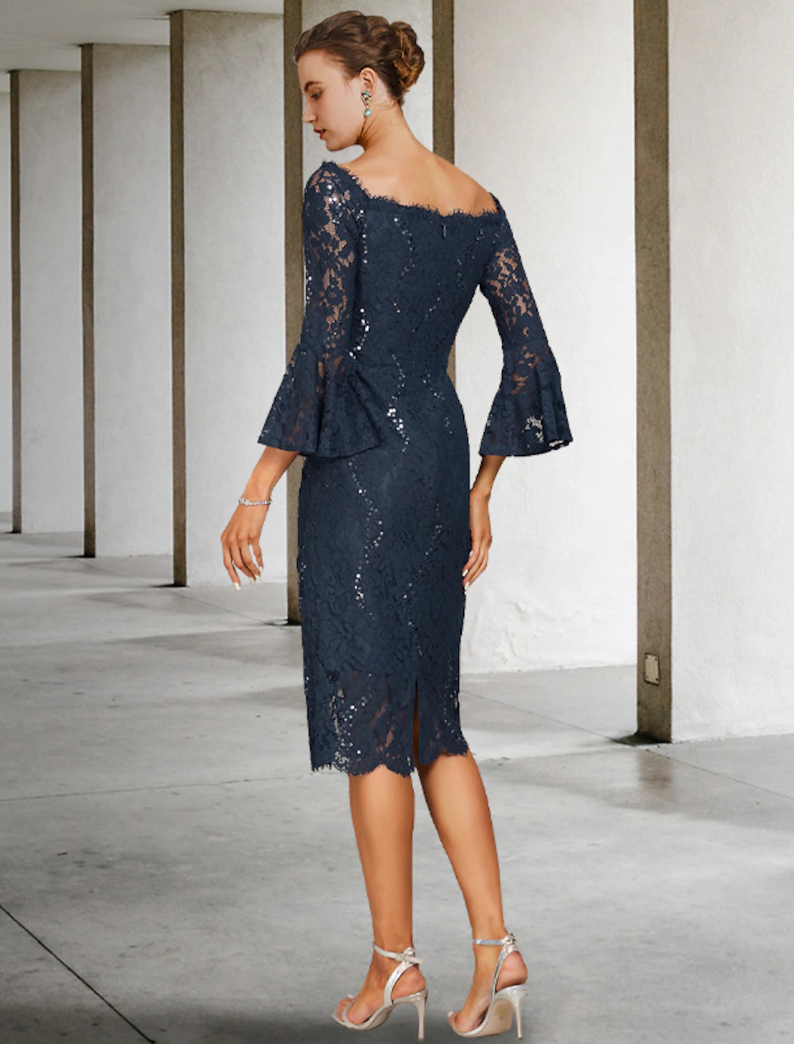 Back view of the Weitese elegant lace and sequin tea-length dress.
