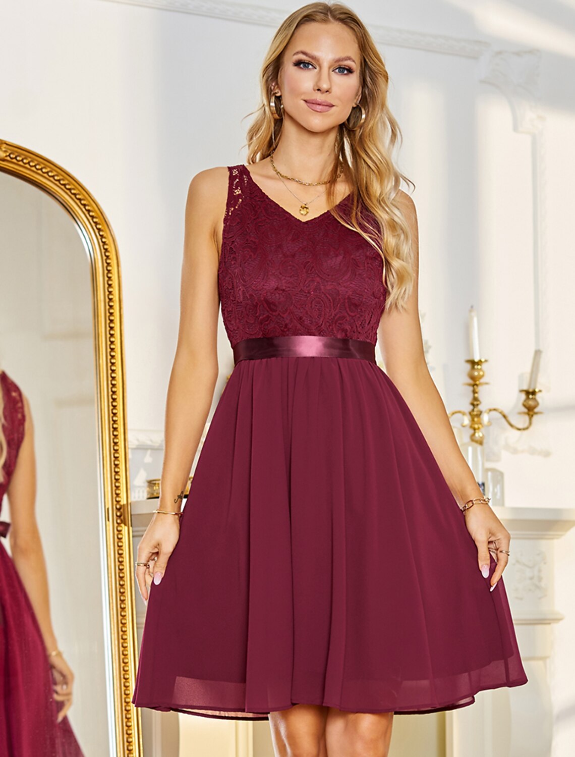 Blue Weitese A-Line V-Neck chiffon cocktail dress with pleats.