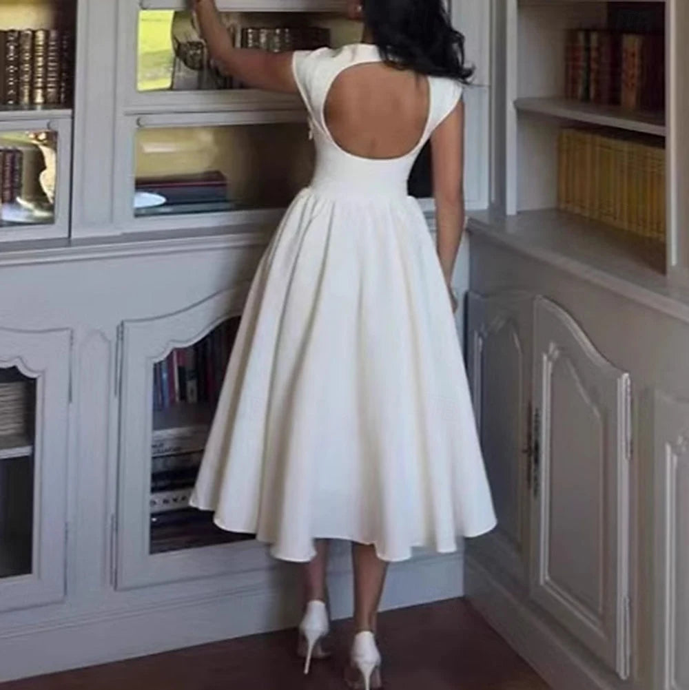 Elegant A-Line Boat Neck Cap Sleeve Pleated Pockets White Midi Homecoming Dress