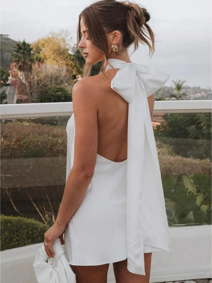 Elegant A-Line Halter Neck Open Back Bow Tie White Mini Homecoming Dresses