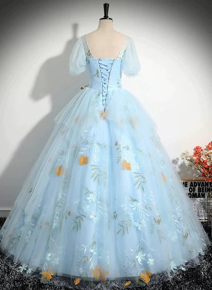 Hermoso vestido dulce de manga corta de tul azul con lazo