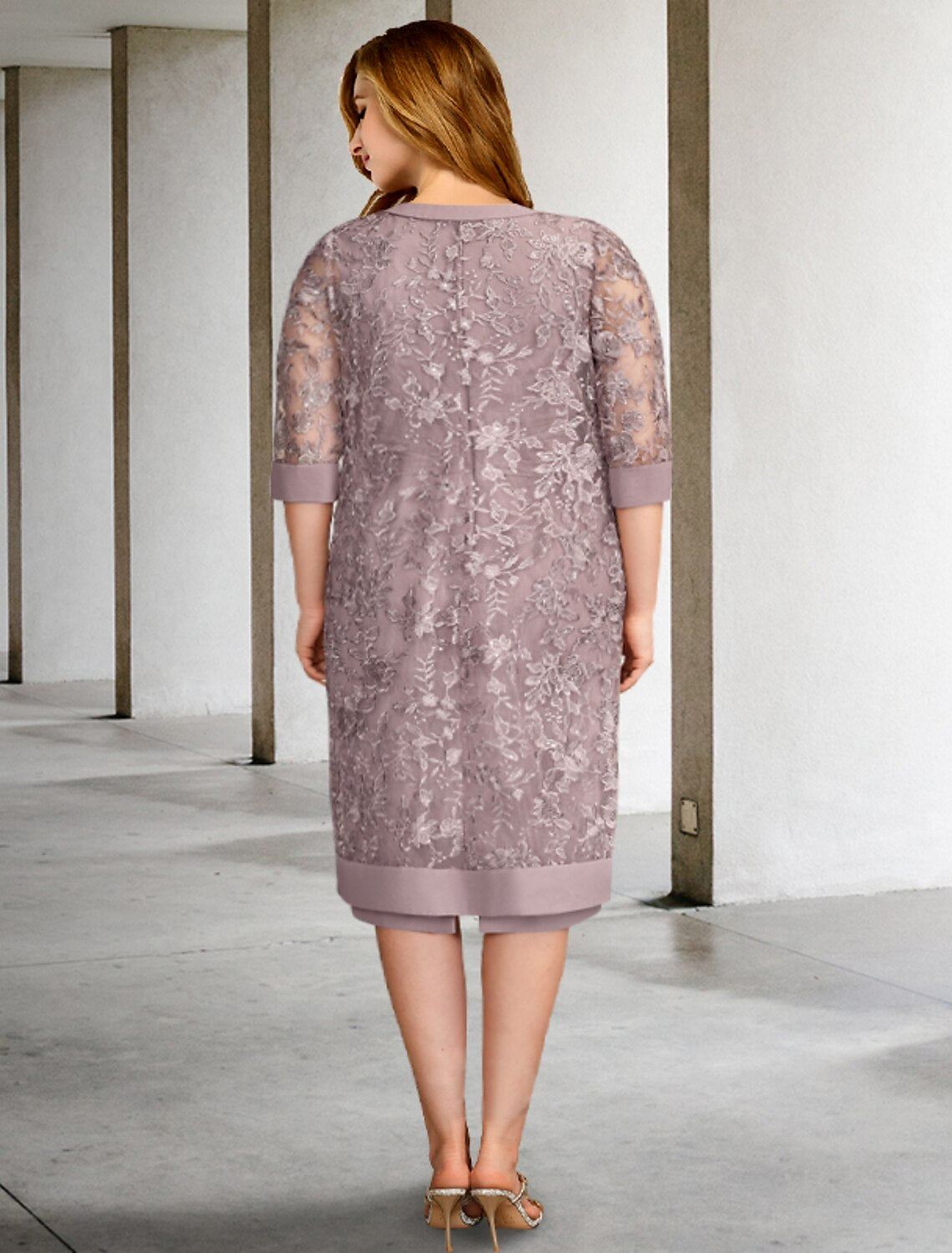 Elegant knee-length two-piece dress featuring a ruched overskirt, worn by a plus size model.