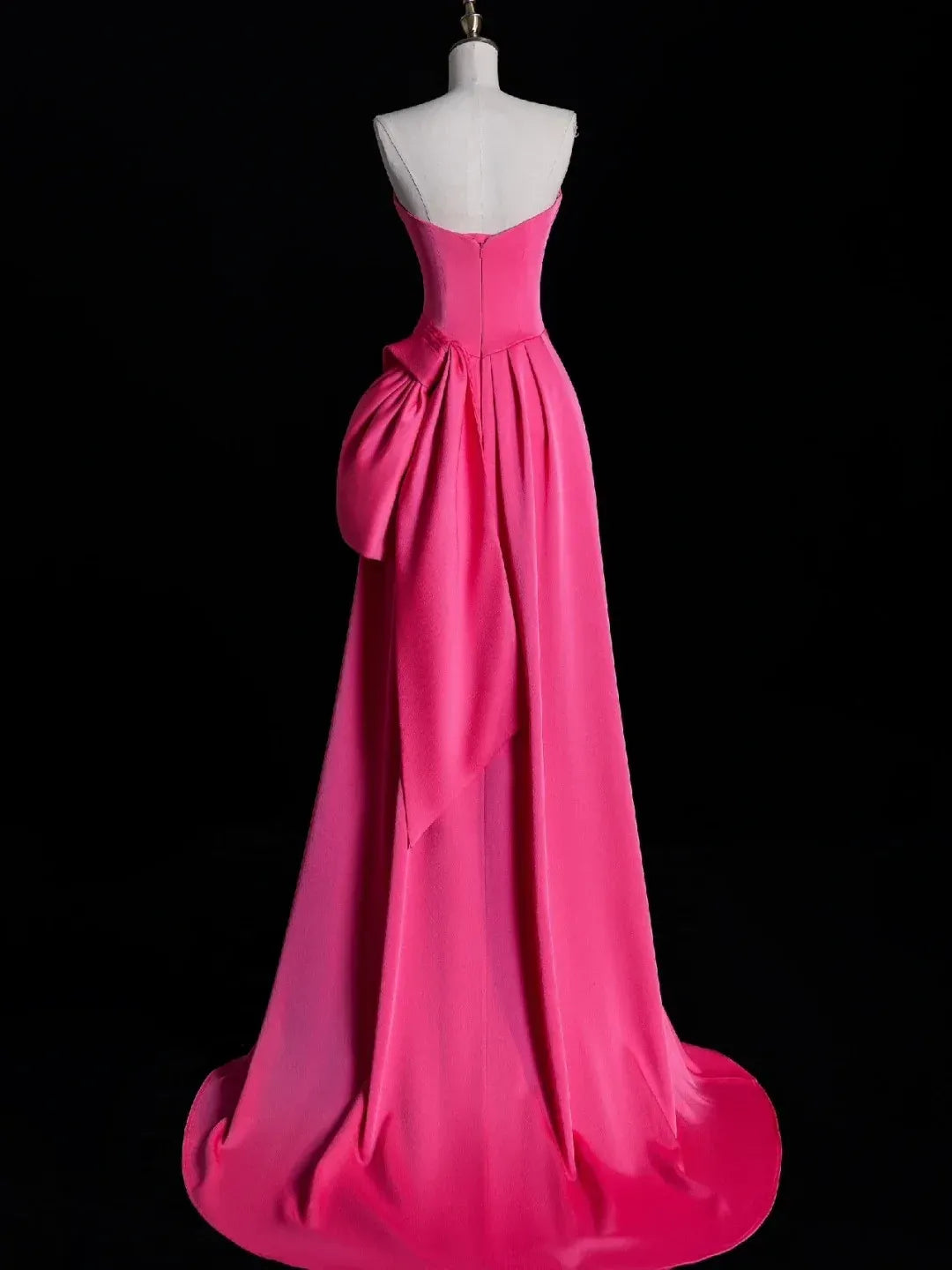 Back view of fuchsia mermaid gown with elegant train.