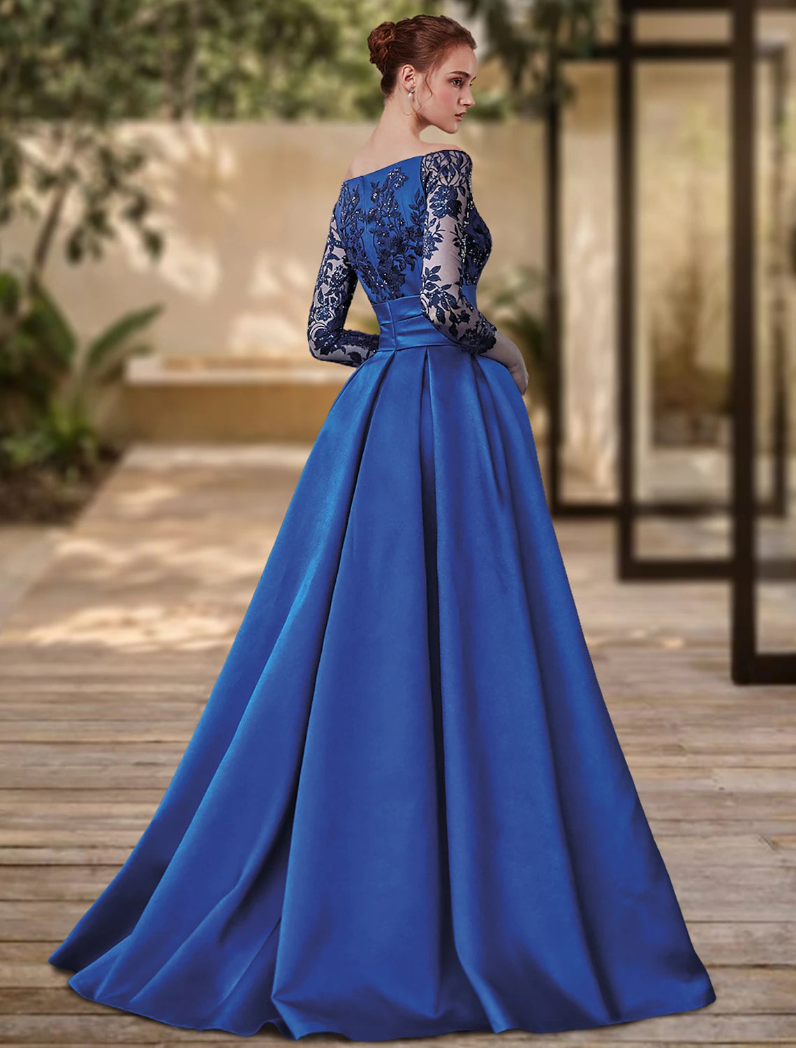 Full length view of the Weitese formal evening gown with 3/4 sleeves and a sweep train.