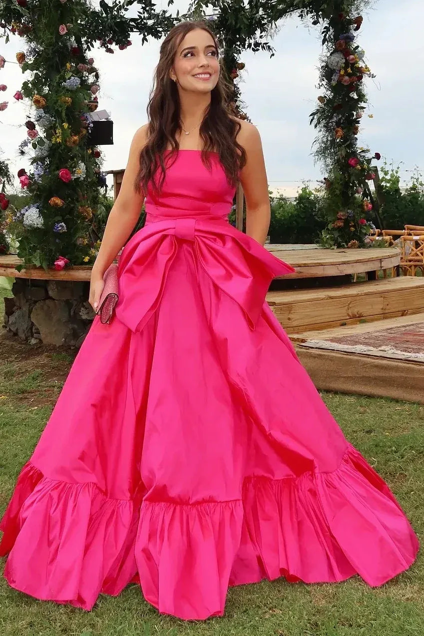 Glamorous Hot Pink Strapless Tiered Ruffled Gown With Oversized Bow