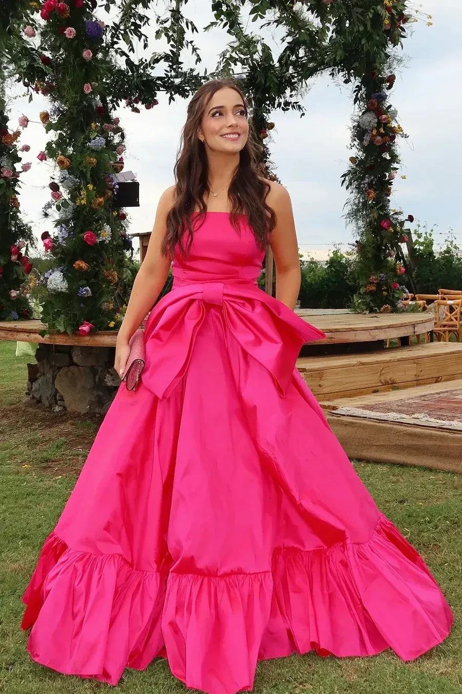 Glamorous Hot Pink Strapless Tiered Ruffled Gown With Oversized Bow