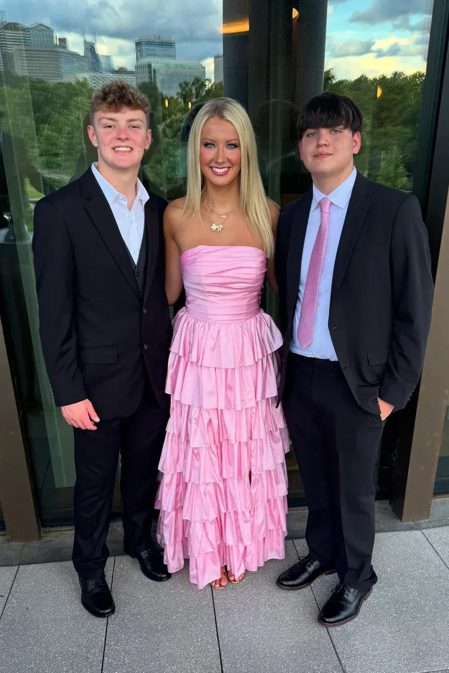 Glamorous Pink Strapless Tiered Ruffled Satin Gown With Slit