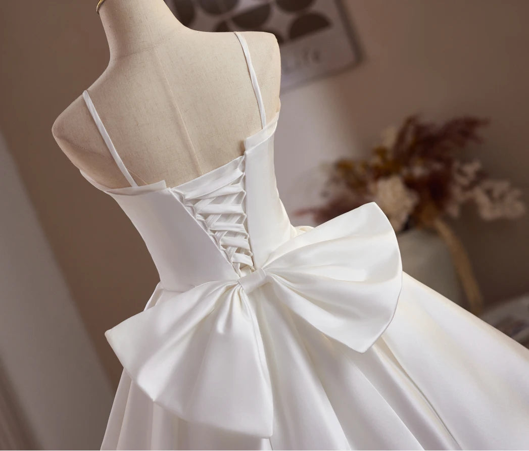 Lovely A-Line Spaghetti Straps Bow-Back Satin White Mini Homecoming Dresses