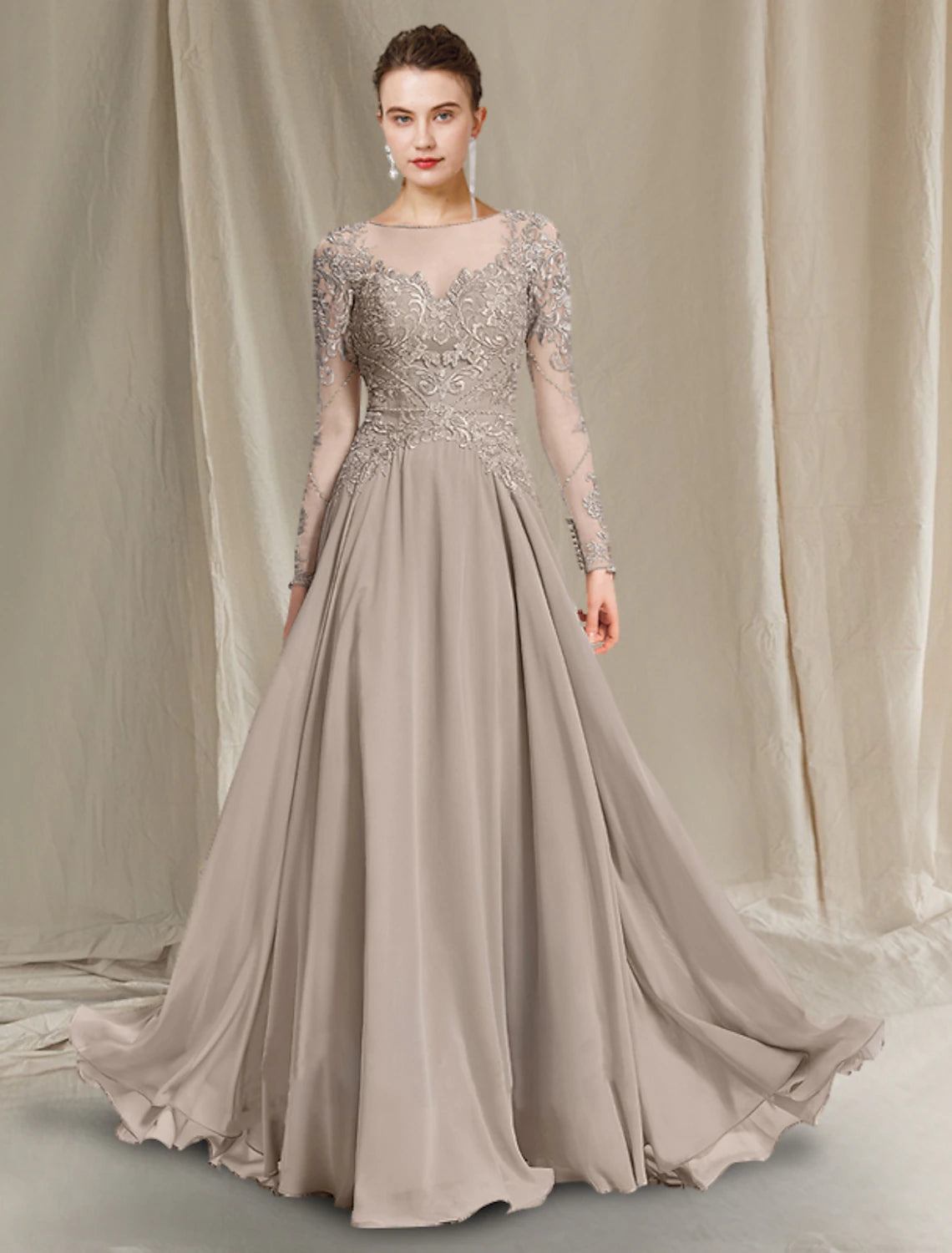 Elegant A-Line Mother of the Bride dress with jewel neck, long sleeves, and lace appliques.