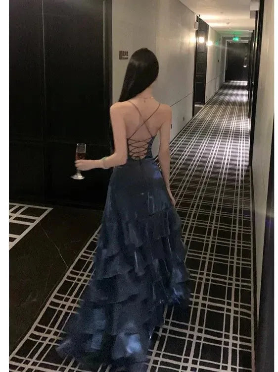 Close-up of the lace-up back detail on the blue mermaid dress.