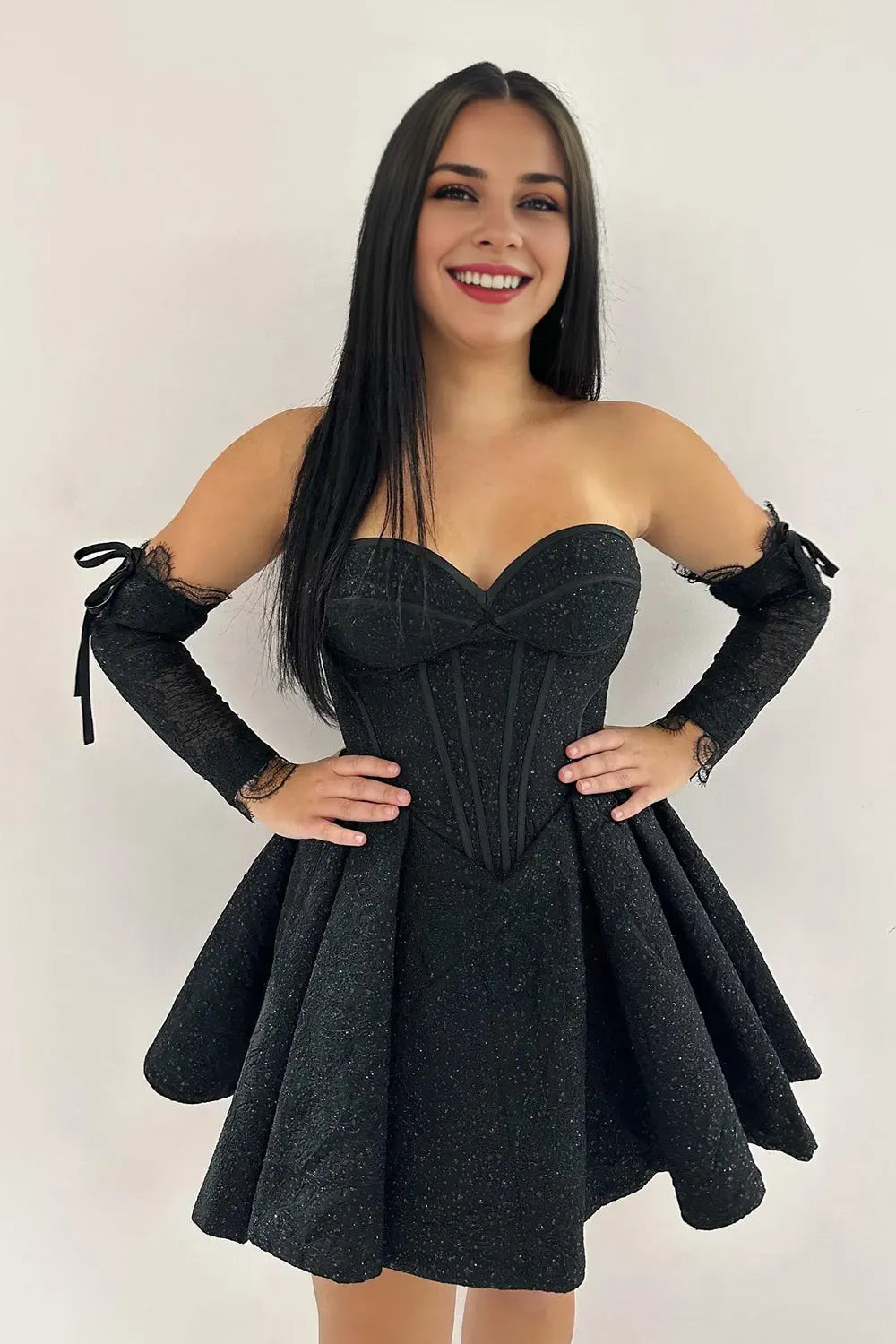 Robe de soirée trapèze à paillettes et épaules dénudées avec corset