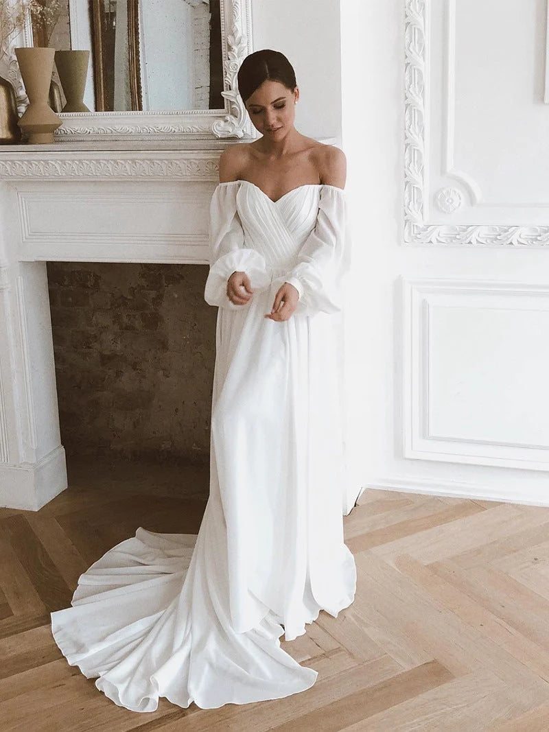Robe de mariée en mousseline de soie à épaules dénudées et manches bouffantes avec traîne 