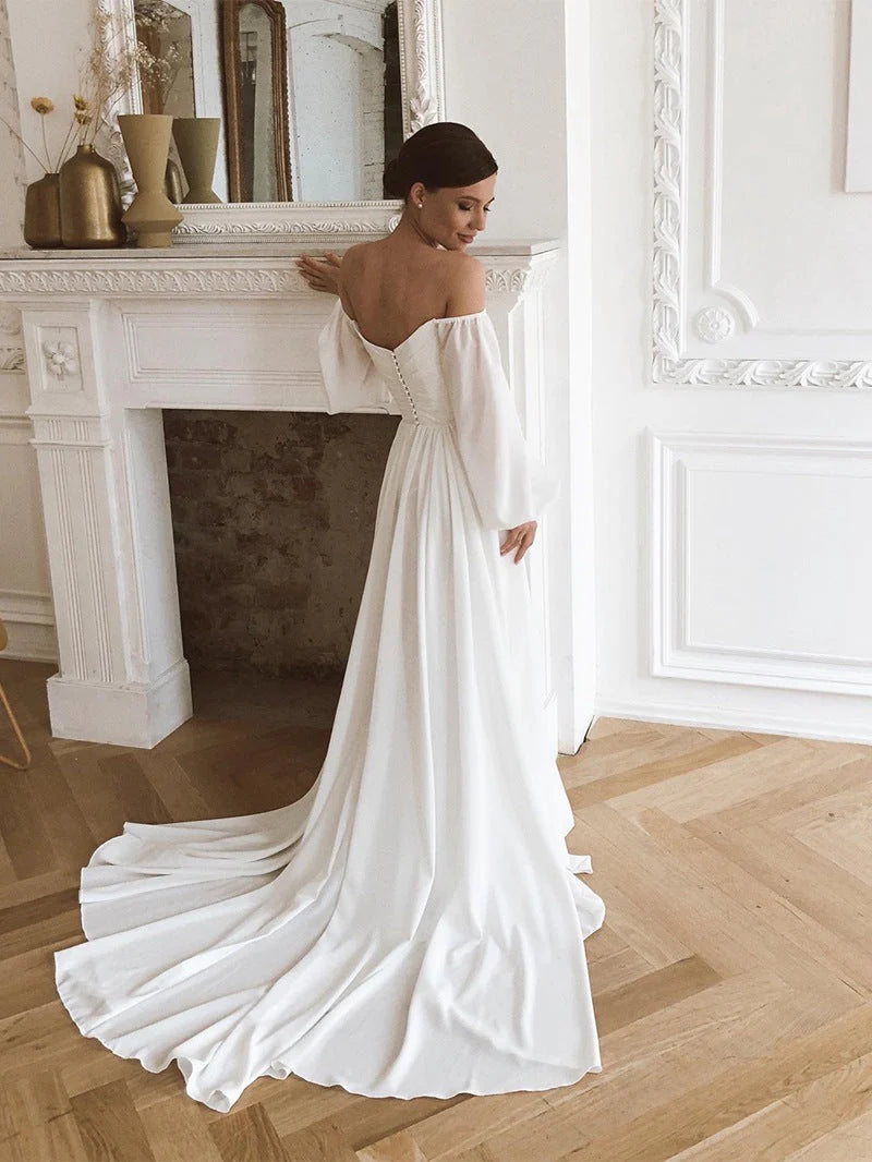 Robe de mariée en mousseline de soie à épaules dénudées et manches bouffantes avec traîne 