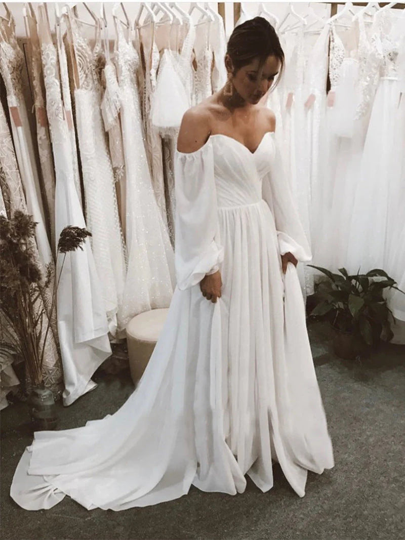 Robe de mariée en mousseline de soie à épaules dénudées et manches bouffantes avec traîne 