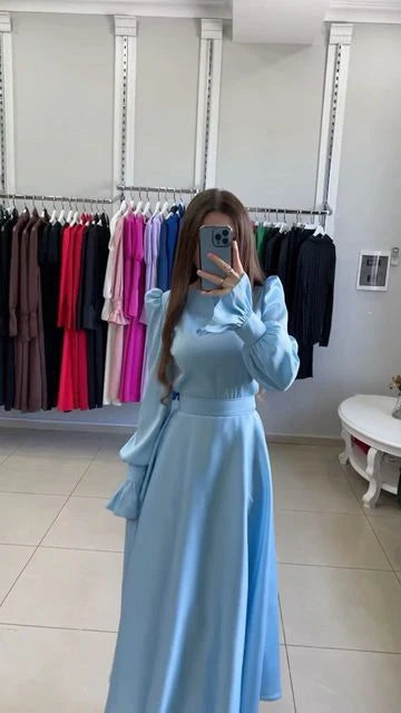 Robe de soirée élégante à manches longues et coupe trapèze