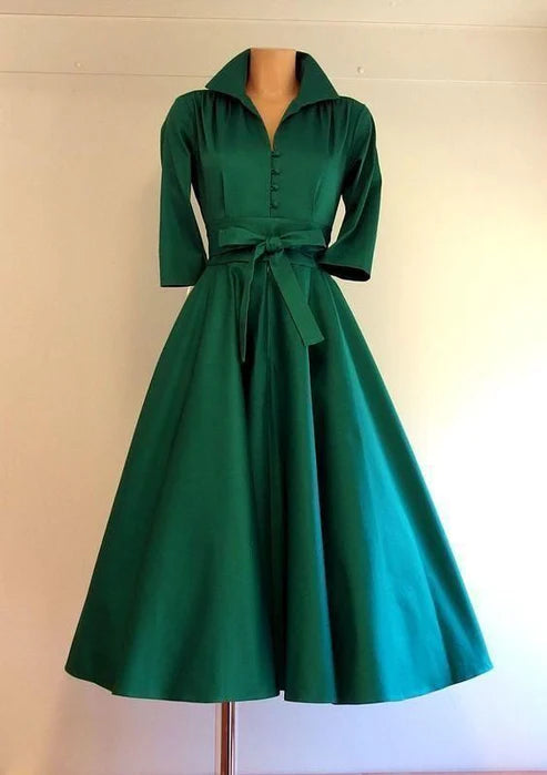 Robe de bal à manches trois-quarts et longueur genou
