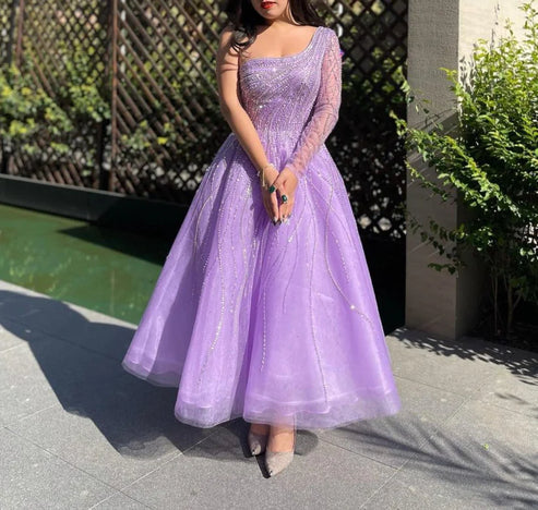 Robe de soirée asymétrique à perles