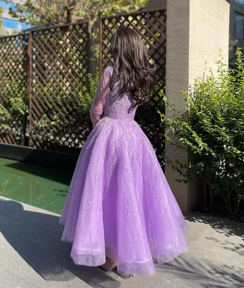 Robe de soirée asymétrique à perles