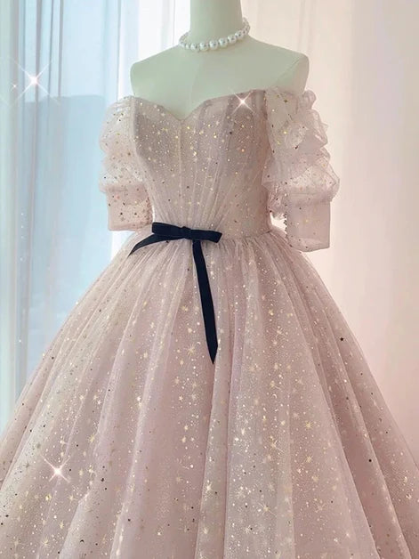 Blush Pink Off The Shoulder Puff Sleeve Glitter Tulle Ball Gown With Black Bow