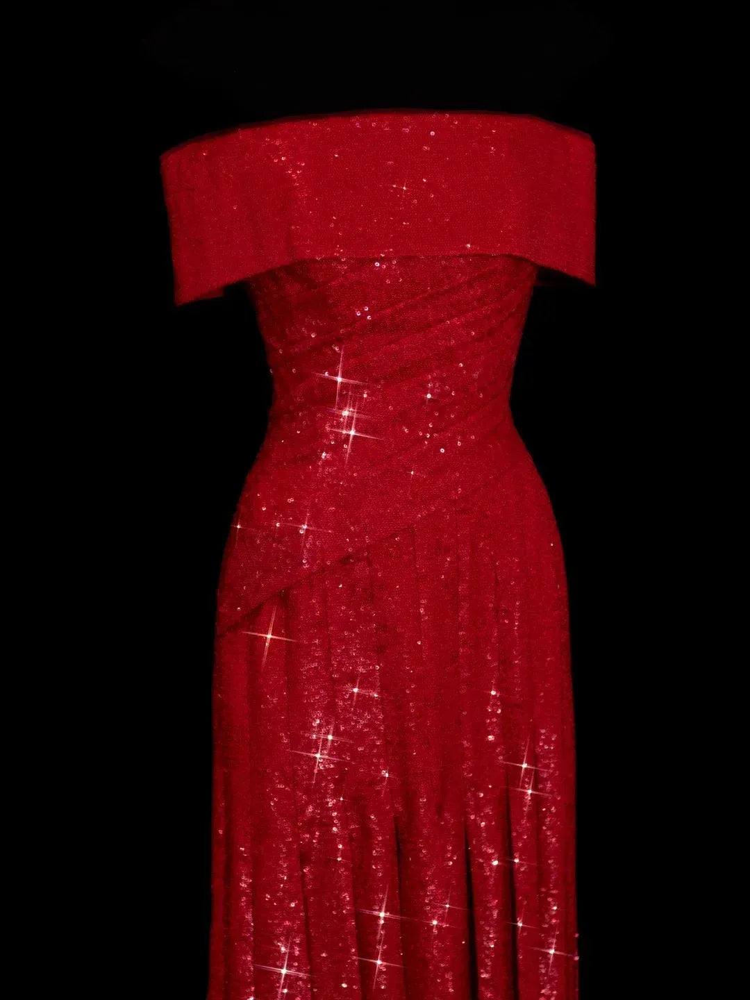 Back view of the red off-shoulder sequin dress, showing the floor-length skirt.