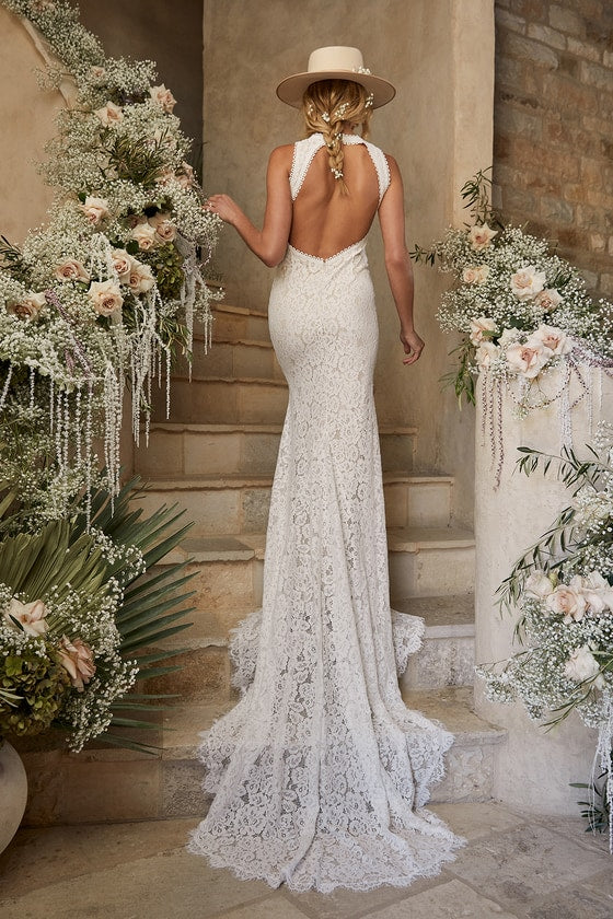 Robe de mariée sirène dos nu en dentelle florale blanche sans manches avec traîne