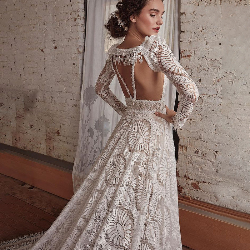 Robe de mariée bohème en dentelle à bretelles spaghetti et traîne magnifique avec manches amovibles