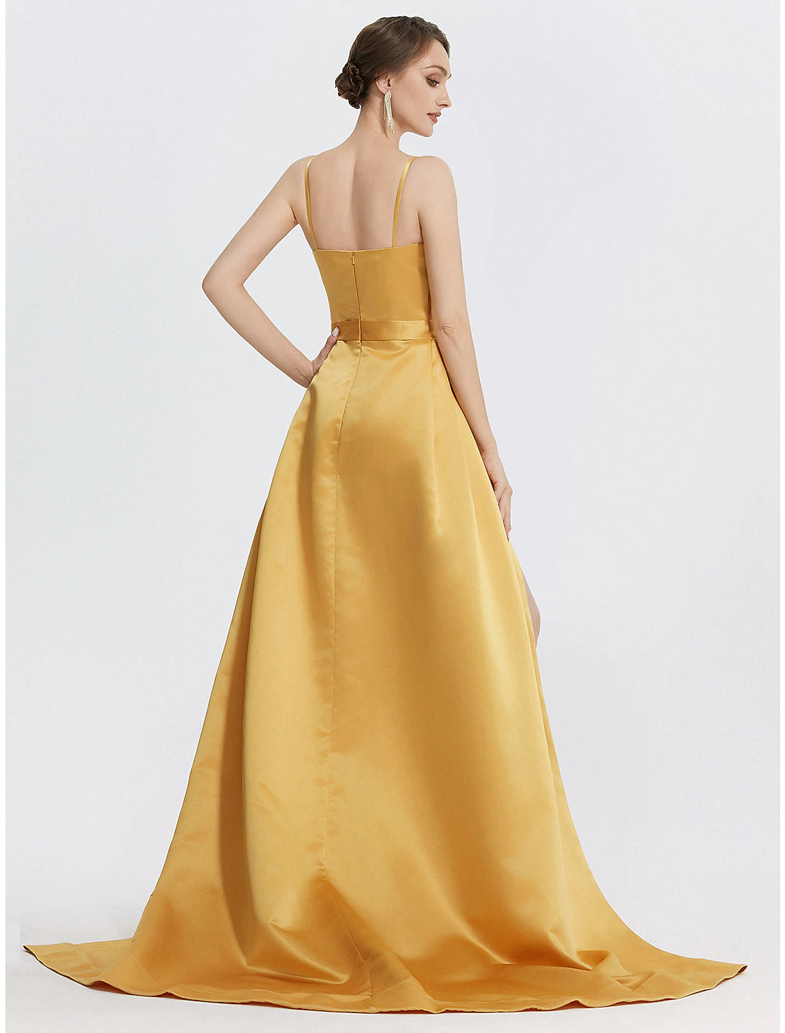 Close-up of the ruched bodice and spaghetti straps of the A-line satin gown.