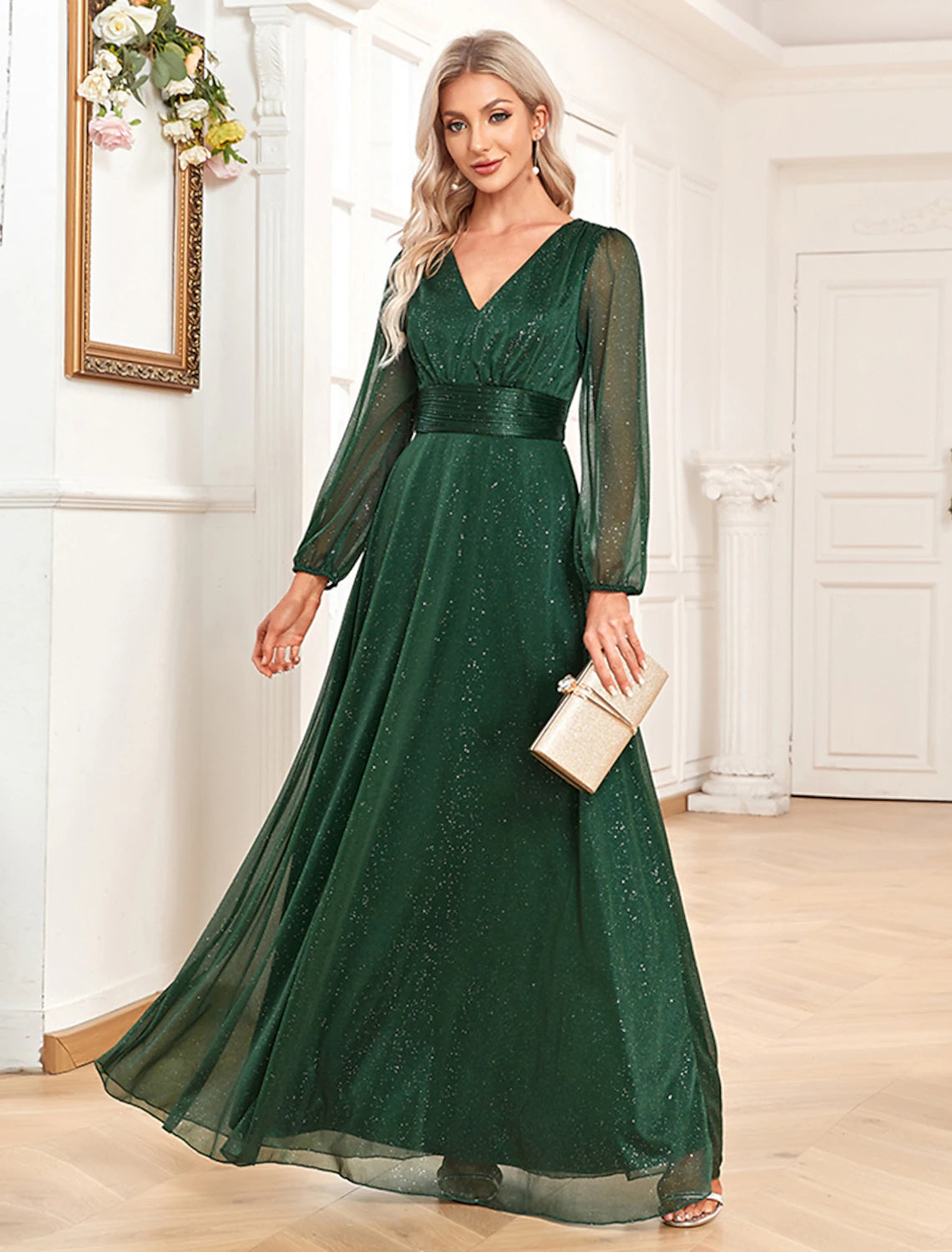 Back view of the elegant long sleeve chiffon evening dress with flowing skirt.