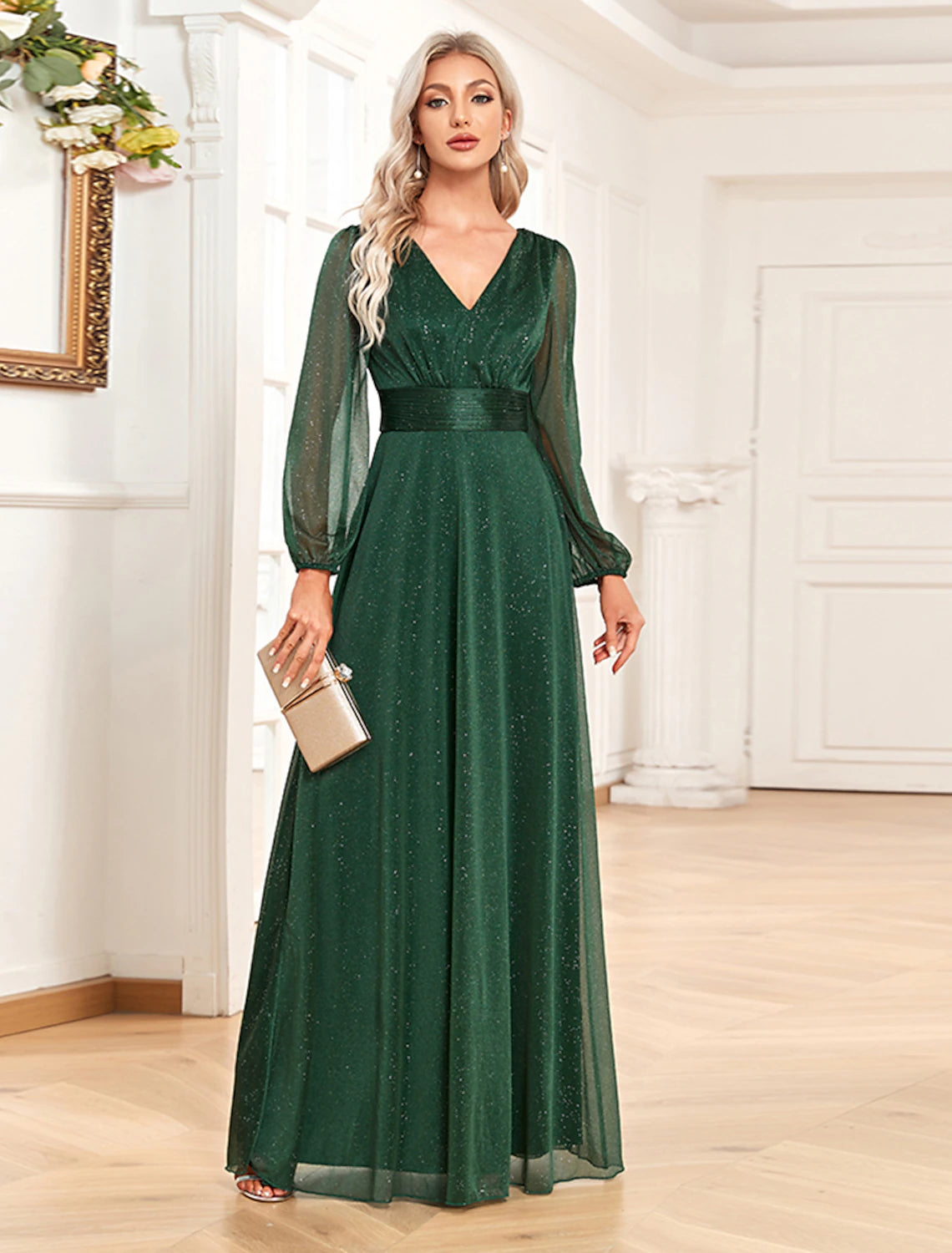 Model posing gracefully in the shimmering A-line formal dress.