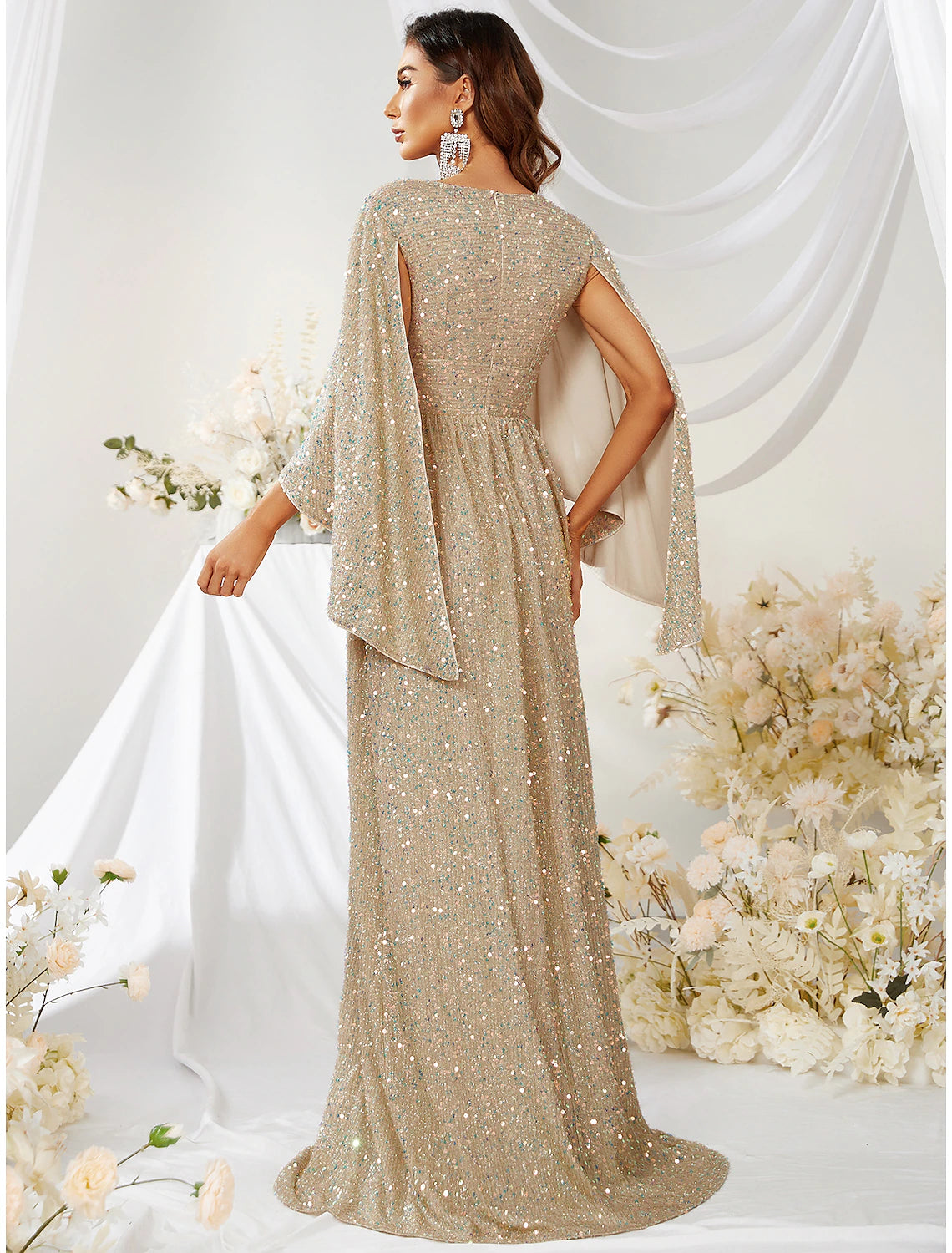 Side view of the sparkling A-line V-neck long-sleeve sequin evening gown.