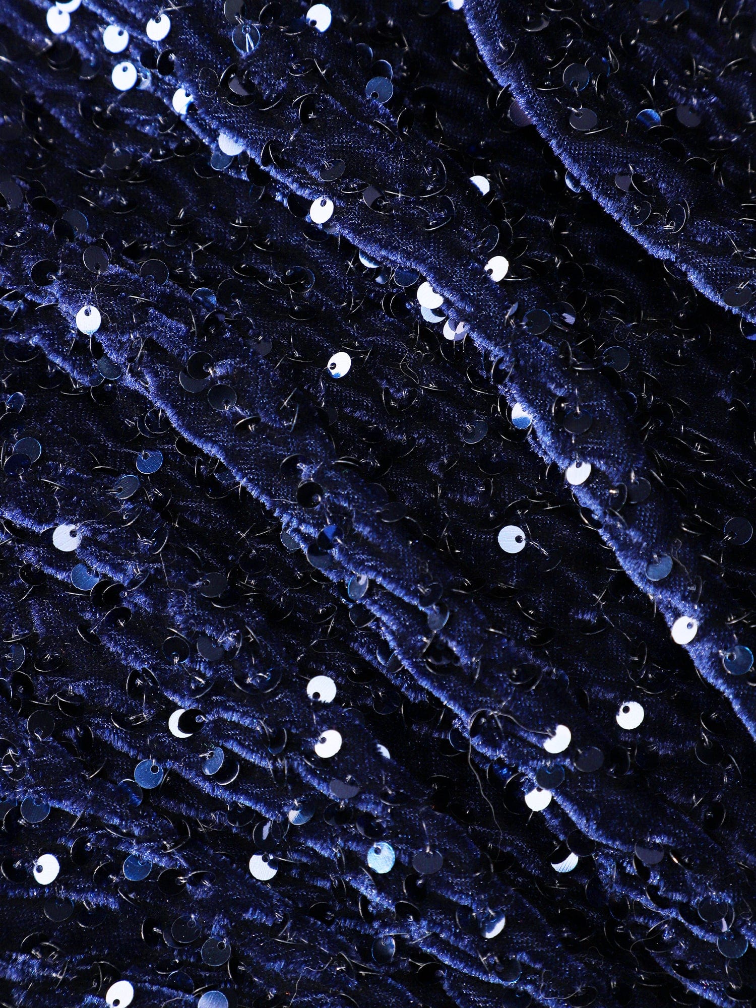 Close-up of the sparkling sequin fabric on the homecoming dress.