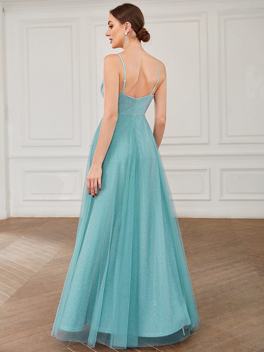 Close-up of sparkly fabric and V-neck illusion panel on bridesmaid dress.