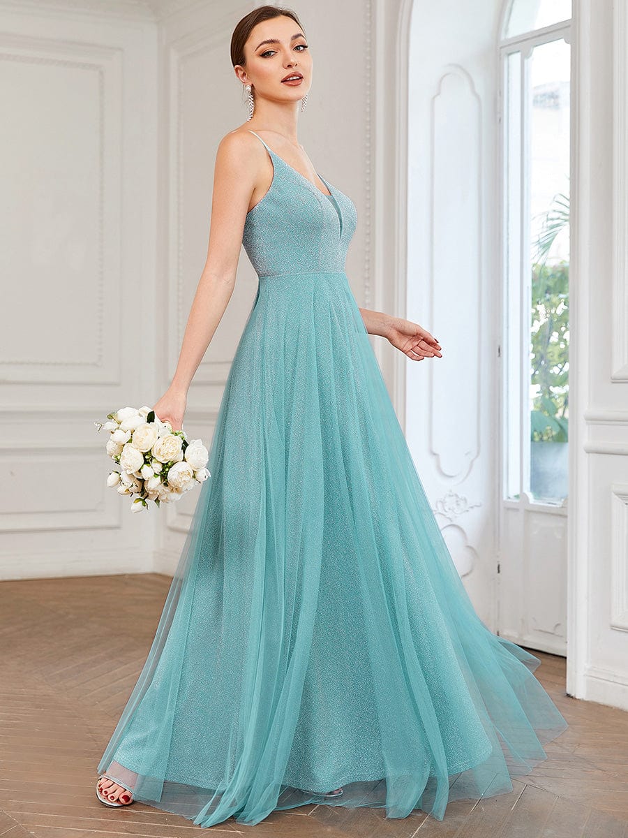 Side profile of a model in the Weitese A-line sparkly gown.