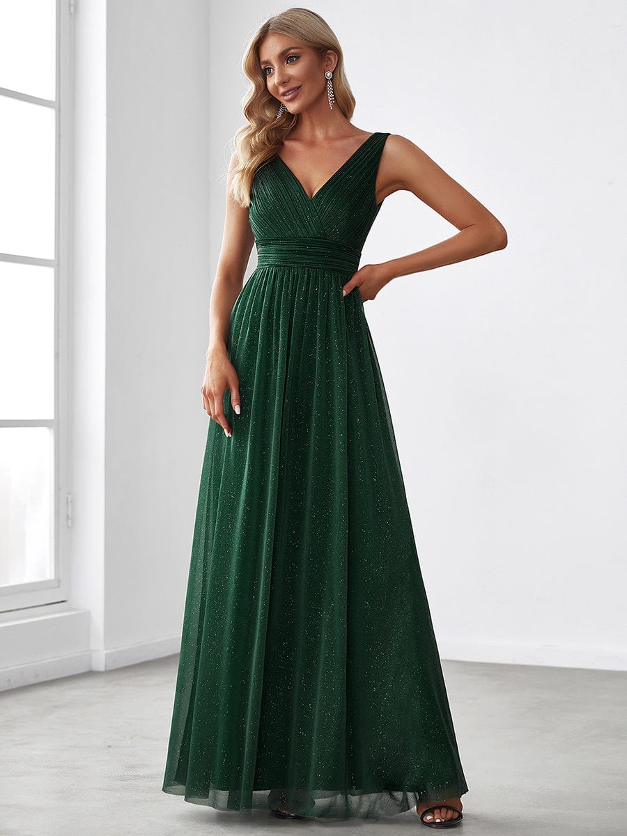Dark green sparkly double V-neck floor length evening dress.