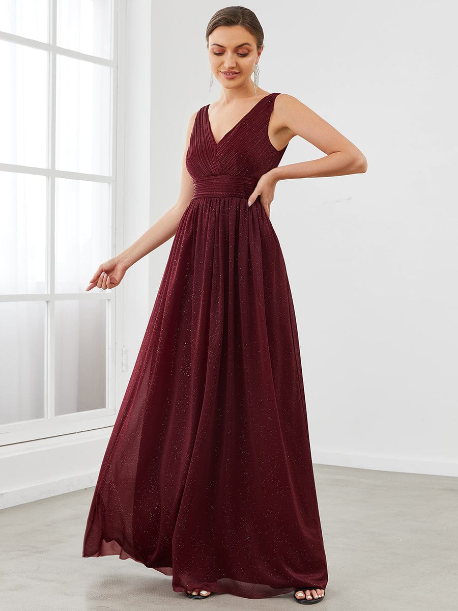 Blue sparkly double V-neck floor length evening dress.