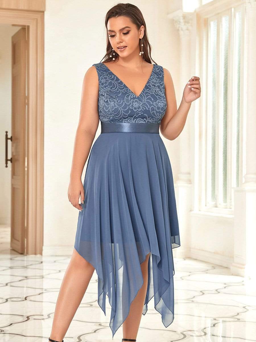 Model wearing a dark blue plus size V-neck lace prom dress.